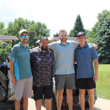 Anderson team at golf event